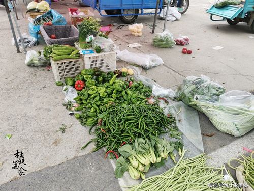 夏天农村赶集卖蔬菜的相关图片
